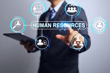 Businessman pointing on human resource icon means managing people in the organization to be ready and have the knowledge and skills to work and develop the organization to progress sustainably