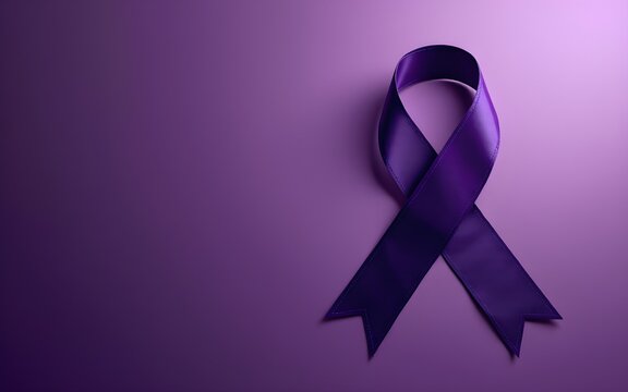 Purple ribbon on rich purple background symbolizing epilepsy awareness, with copyspace, also resonating with Alzheimer's and cancer awareness, representing hope and solidarity. High quality