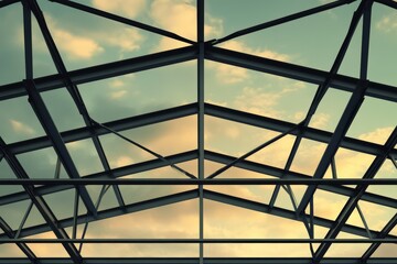 Metal roof structure against a hazy sky.