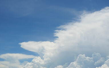 Cumulus cloud on beautiful blue sky in day light , Fluffy clouds formations at tropical zone