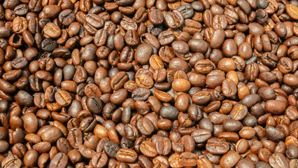 Fresh premium roasted brown Arabica coffee beans background