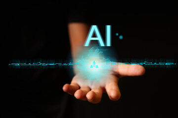 Businessman show artificial intelligence technology with gear icons and automation symbols, representing AI innovation, machine learning, automation, digital transformation, future technology trends.