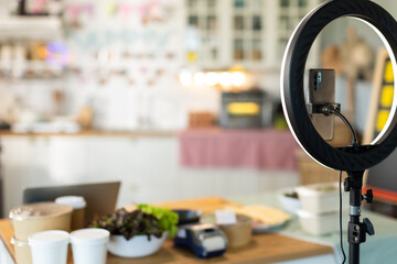 Small business owners are selling .Asian bakery  cake shop owner enjoy posting picture and review her cake on social media or online marketing streaming publish for advertising small business making m