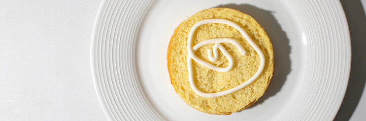 Golden medallion of vanilla cake with whimsical icing spiral, embodying National Dessert Day indulgence, whimsical pastry elegance