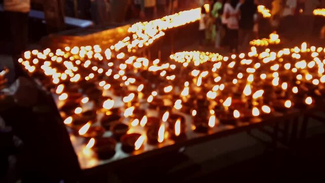 A video of thousands of clay diyas being ignited during a Hindu religious festival celebration