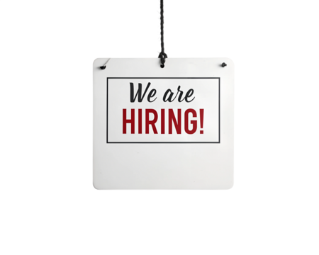 A white sign with red and black text reading We Are Hiring! is hanging from black string against a transparent background.