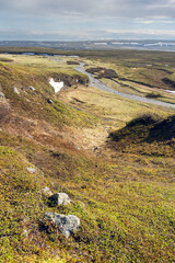 River Gorsajohka flowing in the highlands of Varanger Peninsula. Finmark, Northern Norway