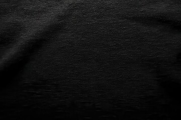 Dark, textured black fabric folds