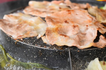 pork barbecue on frying pan, Thai style cuisine