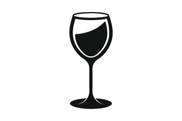 A single, black wineglass stands elegantly with dark liquid partially filling it