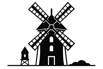 Fototapeta premium Black silhouette shows windmill with adjacent building and base of vegetation under bright sky