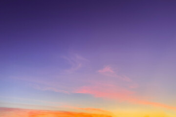 Purple sunrise sky background. Sky with orange golden sunrise clouds. Nature sky background for design.