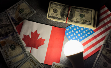 Flag of the United States of America and Canada and dollar banknotes