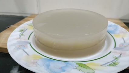 Crystal-clear jelly made from natural coconut water, set to perfection and served as a cooling and hydrating dessert.