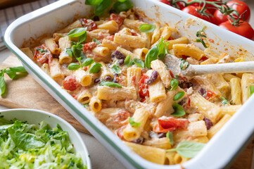 Baked Feta Pasta with kidney beans in a casserole dish fresh and homemade cooked