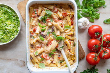 Baked Feta Pasta with kidney beans in a casserole dish fresh and homemade cooked
