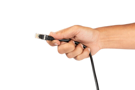Male hand holding a black ethernet cable isolated no background cutout
