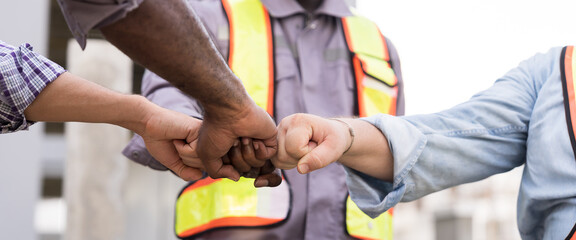 Construction, Engineer, team of construction engineer cooperation in job site. Engineer join hands...