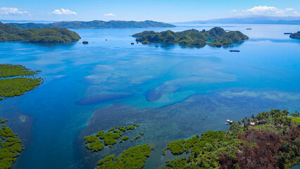 Overlooking Tagana-an and the mangrove forests looking towards Tinago Islet and the Blue Lagoon. Surigao Del Norte, Philippines.