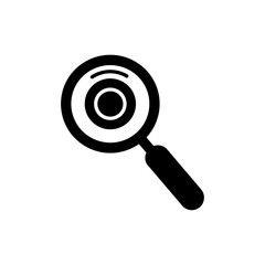 Magnifying Glass Focusing on Coin for Financial Inspection