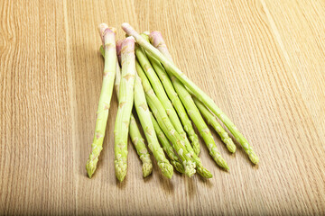 Raw green uncooked asparagus sprout