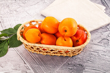 Raw ripe sweet apricots heap
