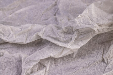 crumpled paper after use, thin paper made of cellulose as a packaging material for clothing