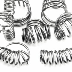 Metal steel spring spare parts for industry isolated on white background