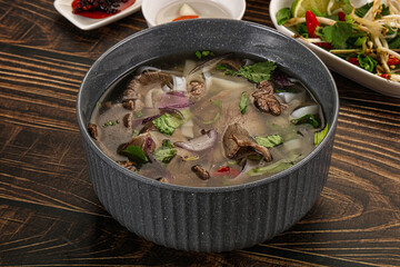 Vietnamese Pho Bo soup with beef and noodles