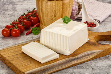 Soft Feta cheese piece with cut