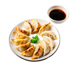 A plate of dumplings with a dipping sauce in the transparent background
