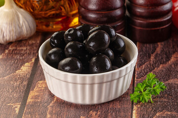 Mediterranean marinated Black olives in the bowl