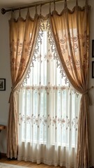 Elegant beige curtains with floral embroidery draped over sheer white panels