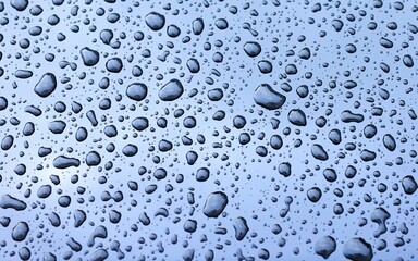 Dimension of rainy season water droplets on glass