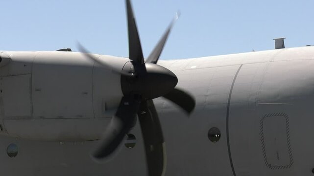 Starting a military aircraft engine, turning a propeller
