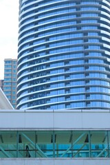 Glass building design construction with evening light and shadow