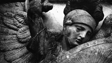 Saint Michael struggles with evil. Fragment of antique statue. Good triumphs over evil concept....