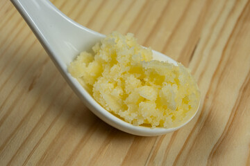 Traditional Indian Ghee In Spoon, Golden Texture.