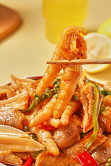 Spicy chicken feet, served with drinks on the table
