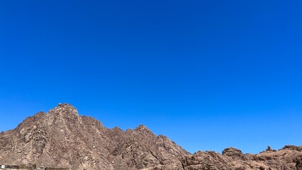 Mountain landscape with blue sky. Copy space. Banner. 