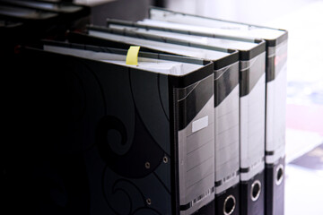 Office folders with papers and documents in the office. Office binders