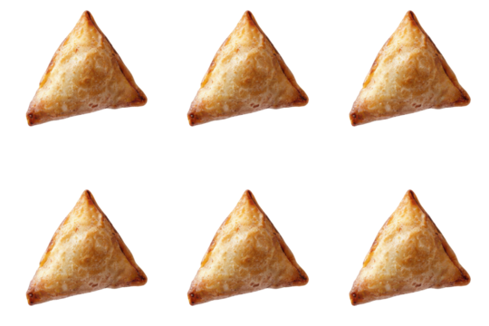 Crispy samosa triangles arranged in a grid pattern against a isolated white background