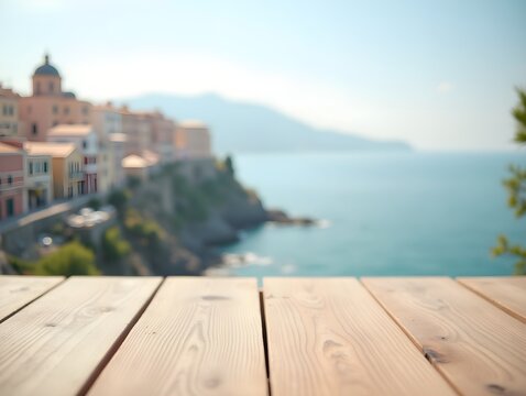 Soft toned wood table with dreamy background of cliffside coastal village, domed rooftops, and serene sea horizon