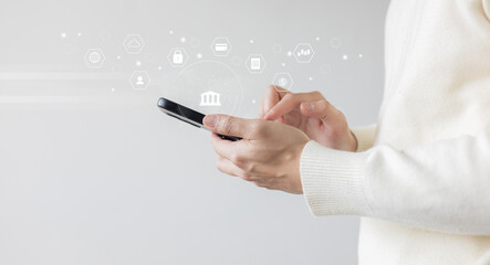 close up customer man hand hold smartphone to use financial application about virtual banking with...