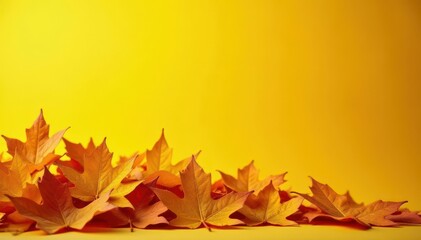 Fototapeta premium Golden autumn leaves piled on a sunny yellow backdrop , wallpaper, leaf pile, surface