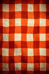 Rustic orange and cream checkered fabric texture warm autumnal tones gingham pattern background