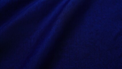 Deep blue cloth texture with soft ripples and shadows for background