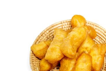Deep-fried dough sticks in a woven basket