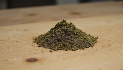 Glimmering arsenic powder on wood