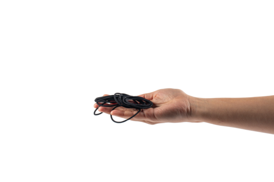 Black rubber band in hand isolated on transparent background